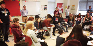 group of students sitting together in classroom