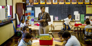 teacher with group of students