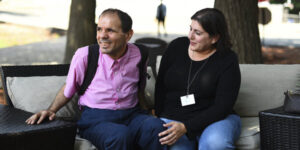 adult student with disabilities wearing backpack