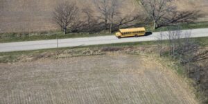 bus on a lone rural road countryside