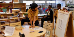 students and teacher in classroom