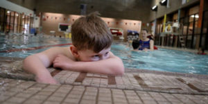 Child with autism swimming