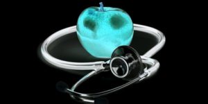 neon teal apple with stethoscope