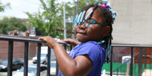 young black girl playing