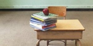 empty desk with books